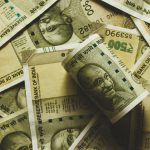 Rupee Slips By 5 Paise To Close at 77.60 Against US Dollar